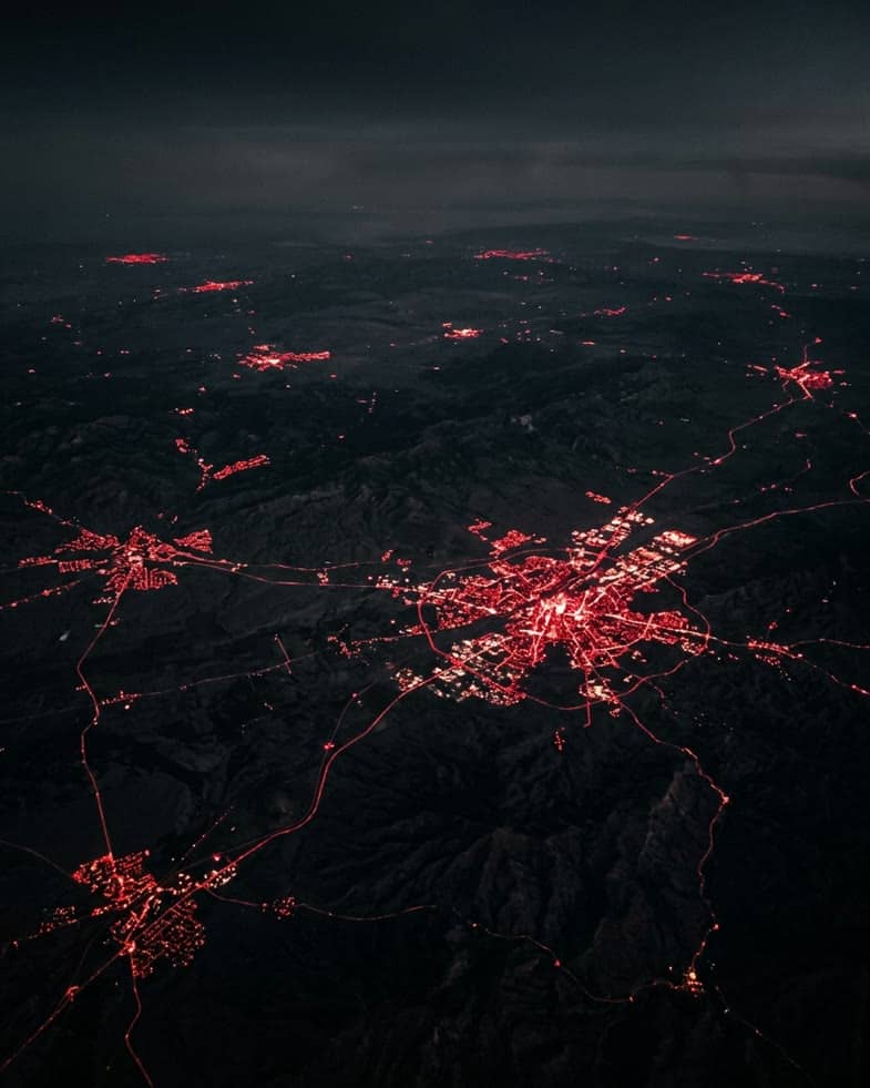 Aerial night view of South Africa showing the lit clusters of its cities and the highways between them